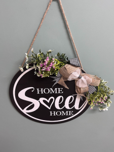 Hanging sign reads "Home Sweet Home"